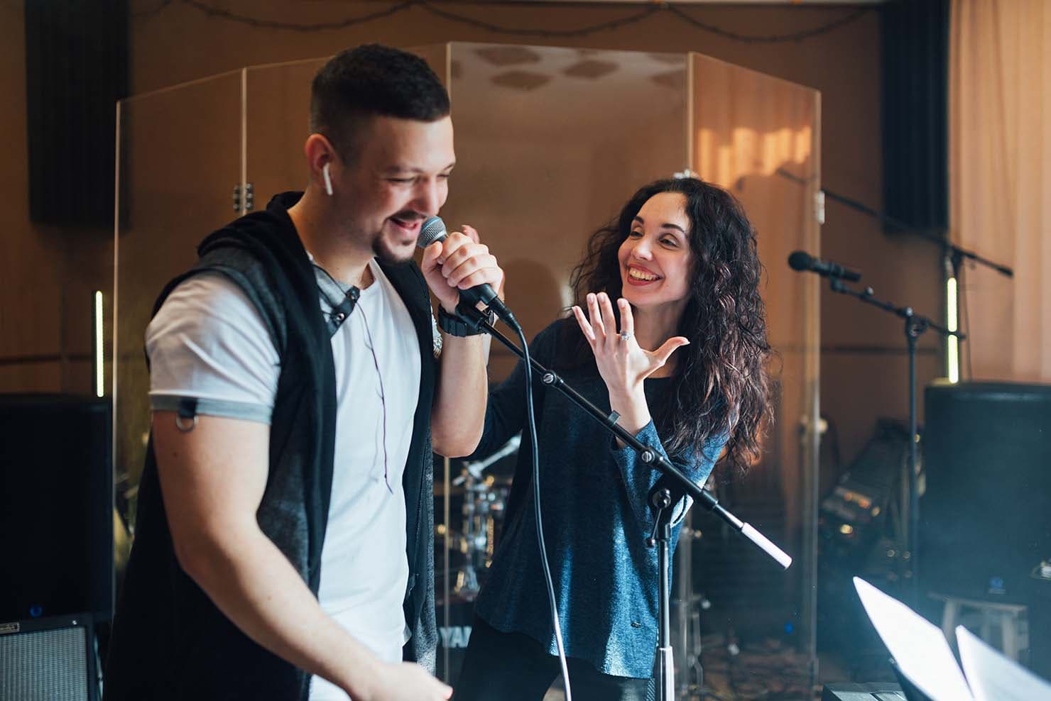 A person singing into a microphone