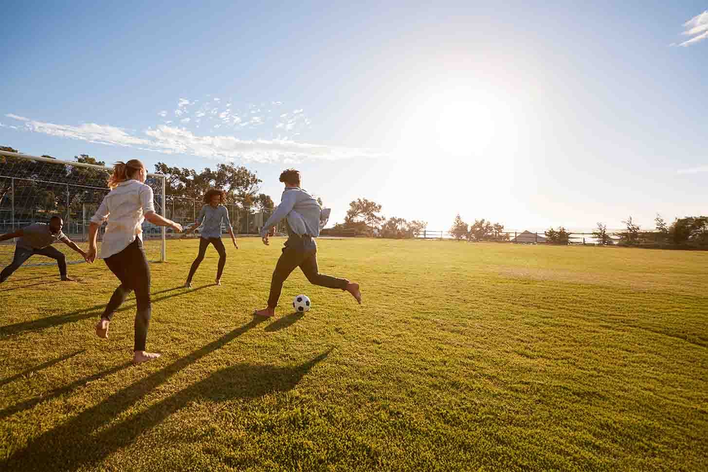 A soccer player kicking a ball