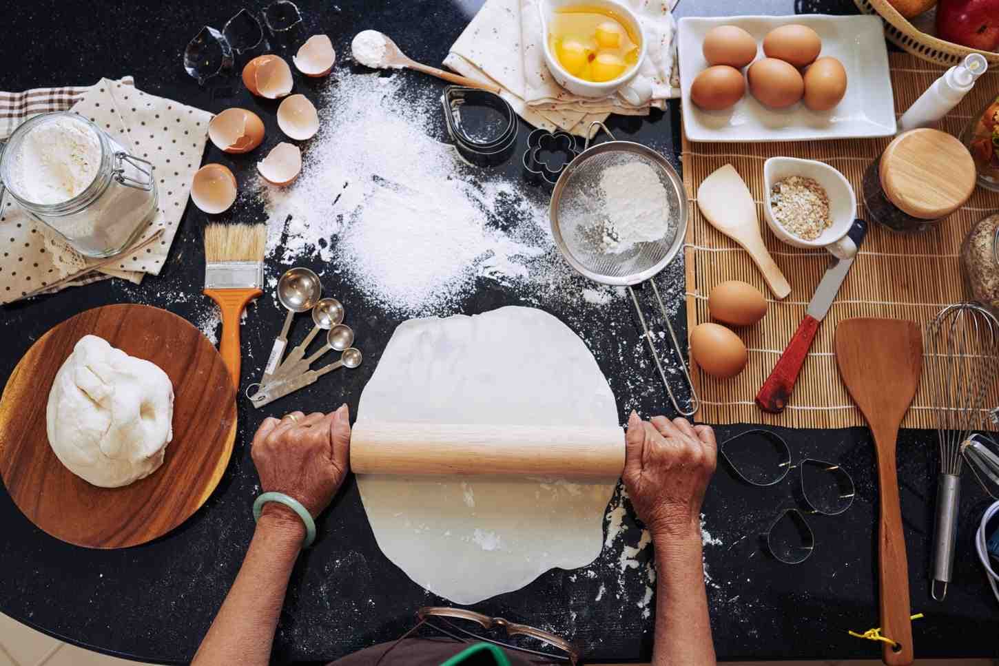 A chef preparing food in a kitchen
