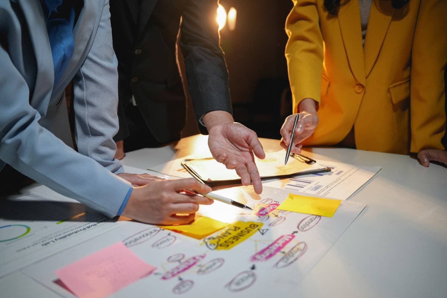 A professional working on project management visuals