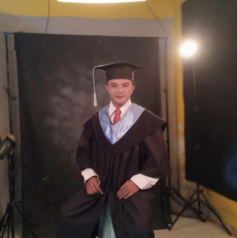 Graduation ceremony photo of NEIL JOHN 