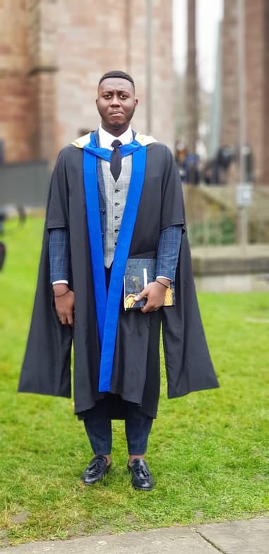 Graduation ceremony photo of Eric 