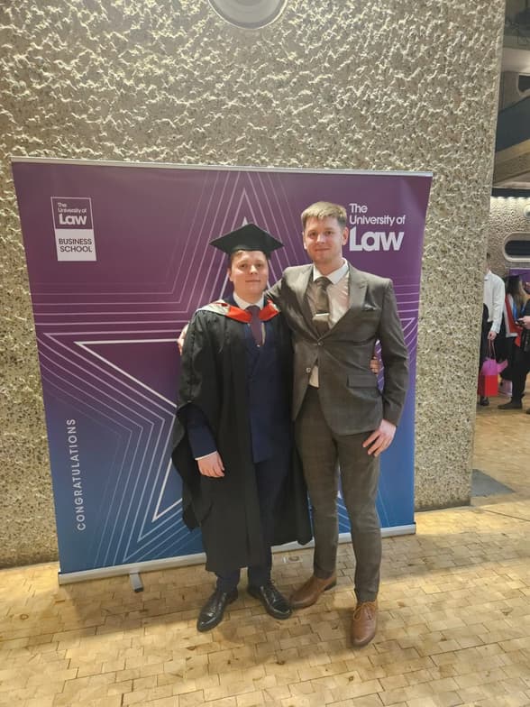 Graduation ceremony photo of Lewis 