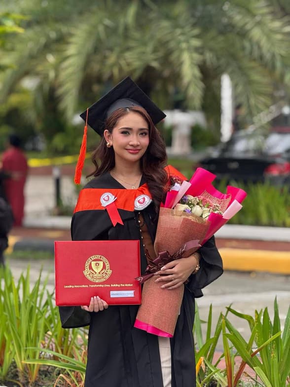 Graduation ceremony photo of Jean 