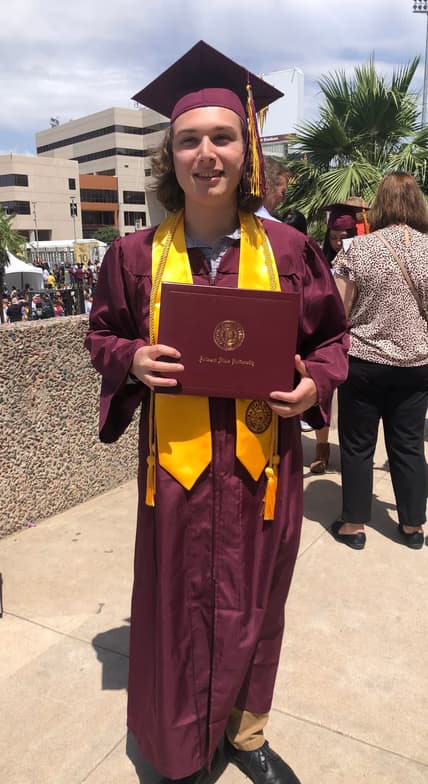 Graduation ceremony photo of Eli 