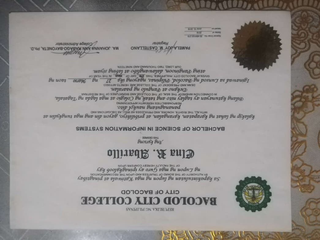 Verified degree or teaching certification of Elna  