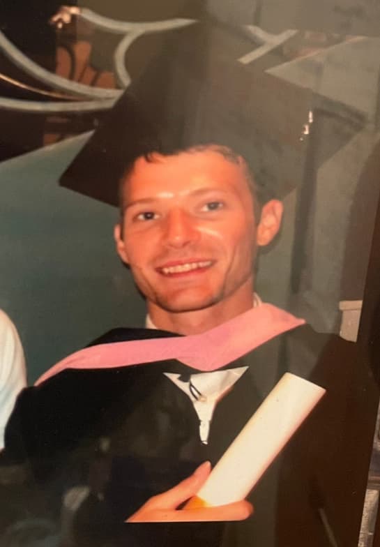 Graduation ceremony photo of Brian 