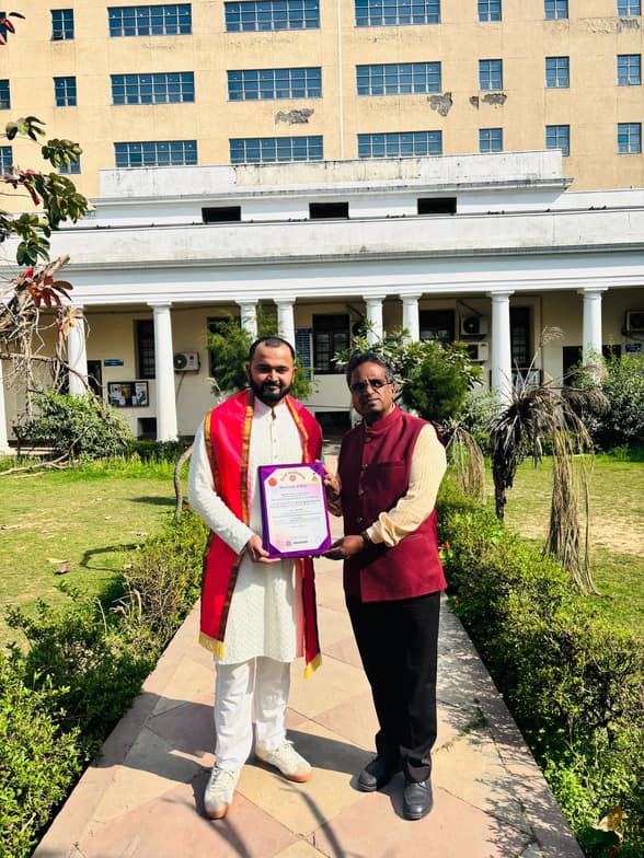 Graduation ceremony photo of Deepak  