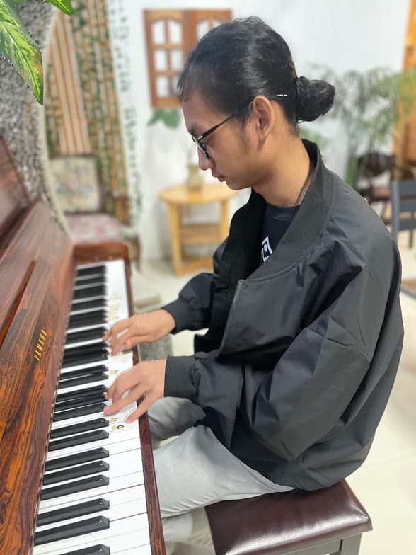 Saw Samuelenjoying a hobby outside teaching 