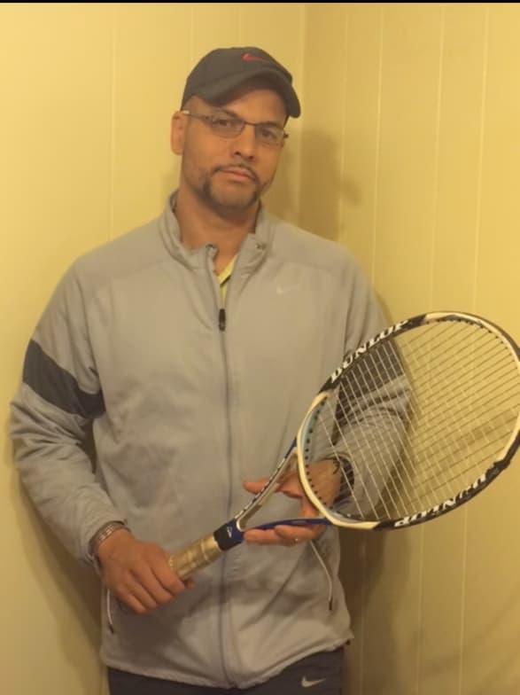 Joseph enjoying a hobby outside teaching 