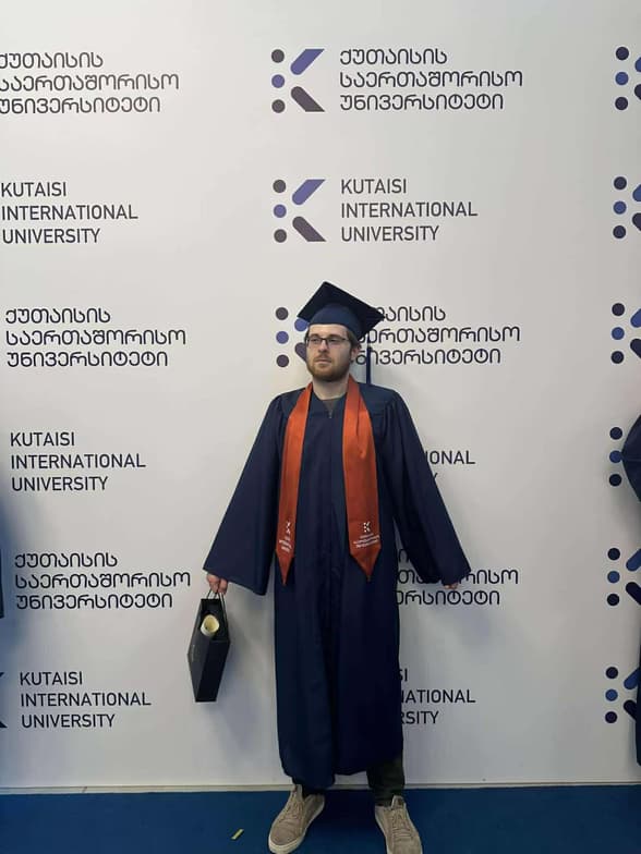 Graduation ceremony photo of Beqa 