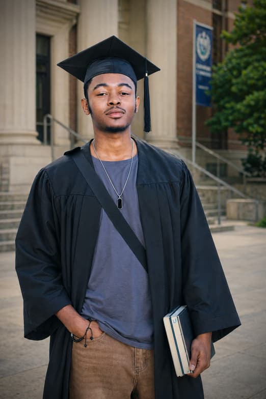 Graduation ceremony photo of Mark Hekima 
