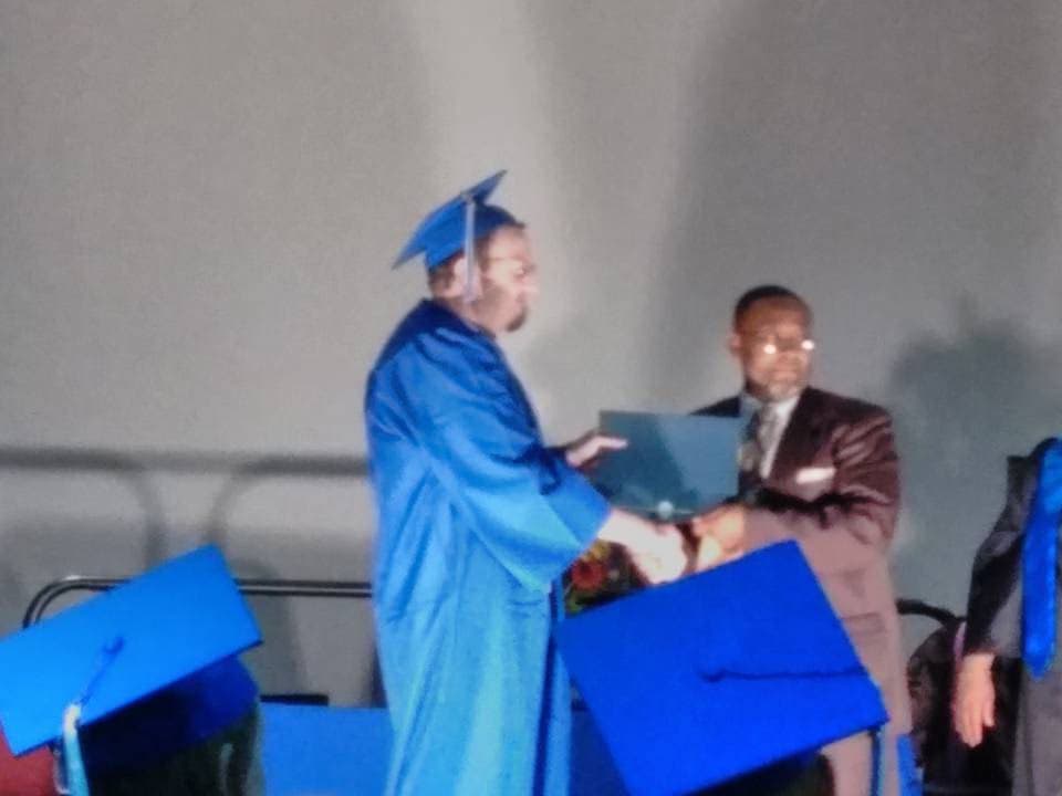 Graduation ceremony photo of Leo 