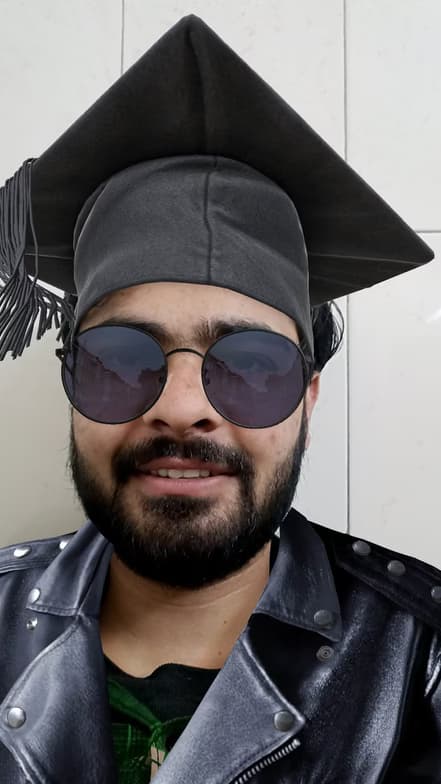 Graduation ceremony photo of Aman 