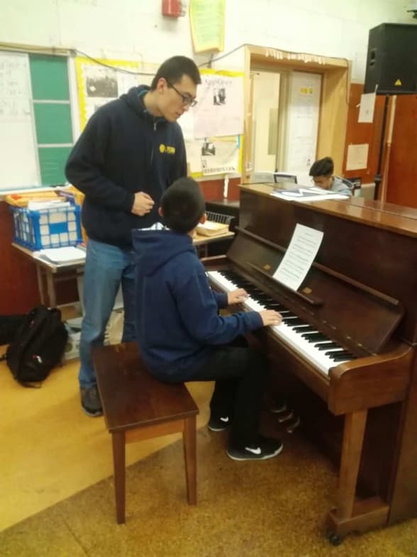 Hao conducting a lesson 