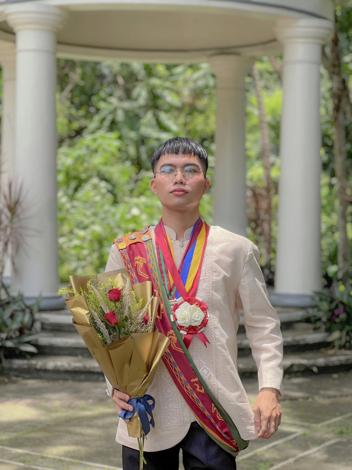 Graduation ceremony photo of Alvin Jay